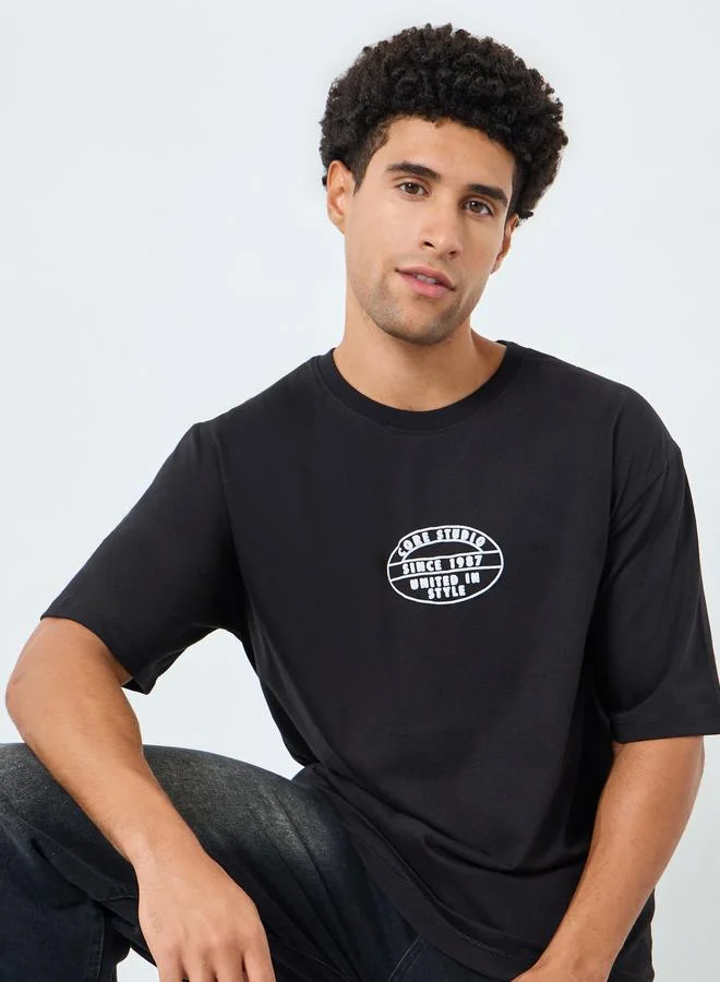 Styli Men Oversized HD Emblem Graphic Jersey T-Shirt